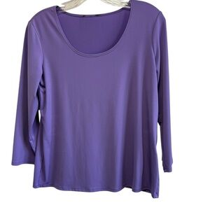 Purple stretchy top by Slinky Brand long sleeves round neck small